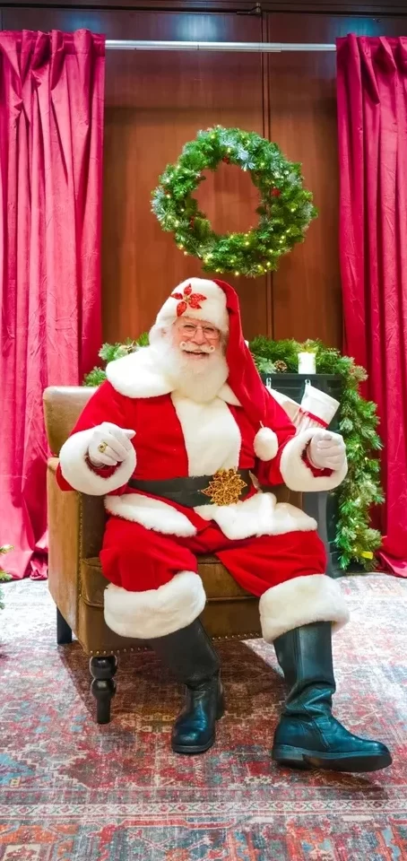 Santa Clause sitting down.