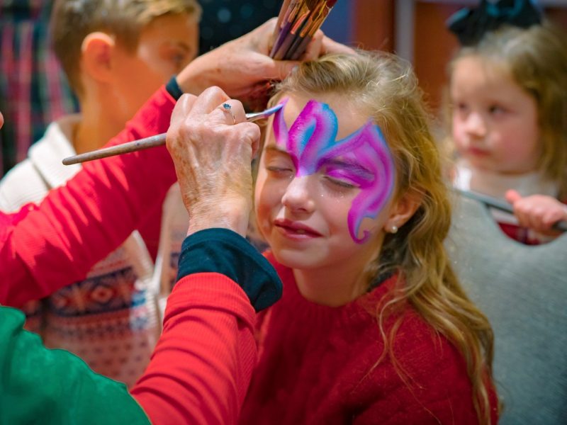 Face painting at Santa Brunch.